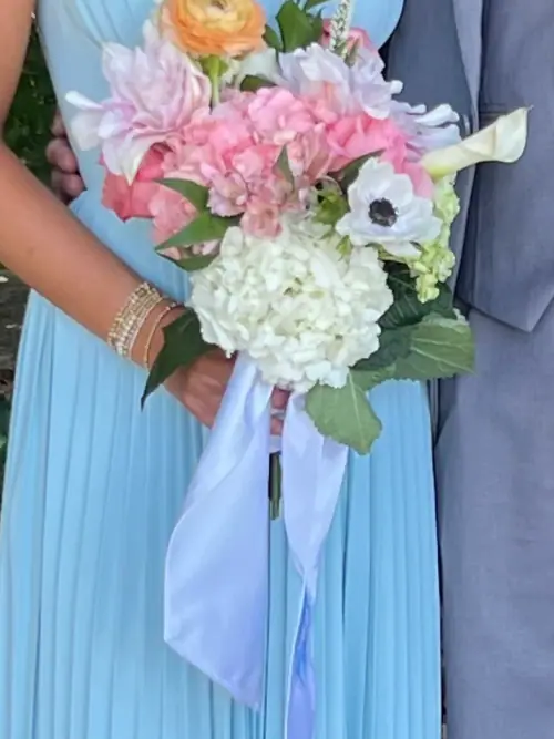 Pale pink hydrangea, white anemone and peach rose bouquet finished with a lilac ribbon